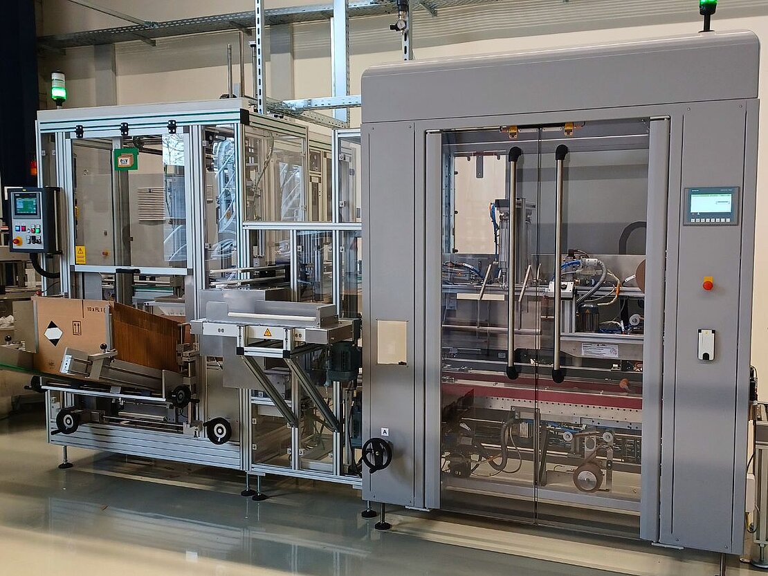 Kartonagemaschine der Verpackungsanlage